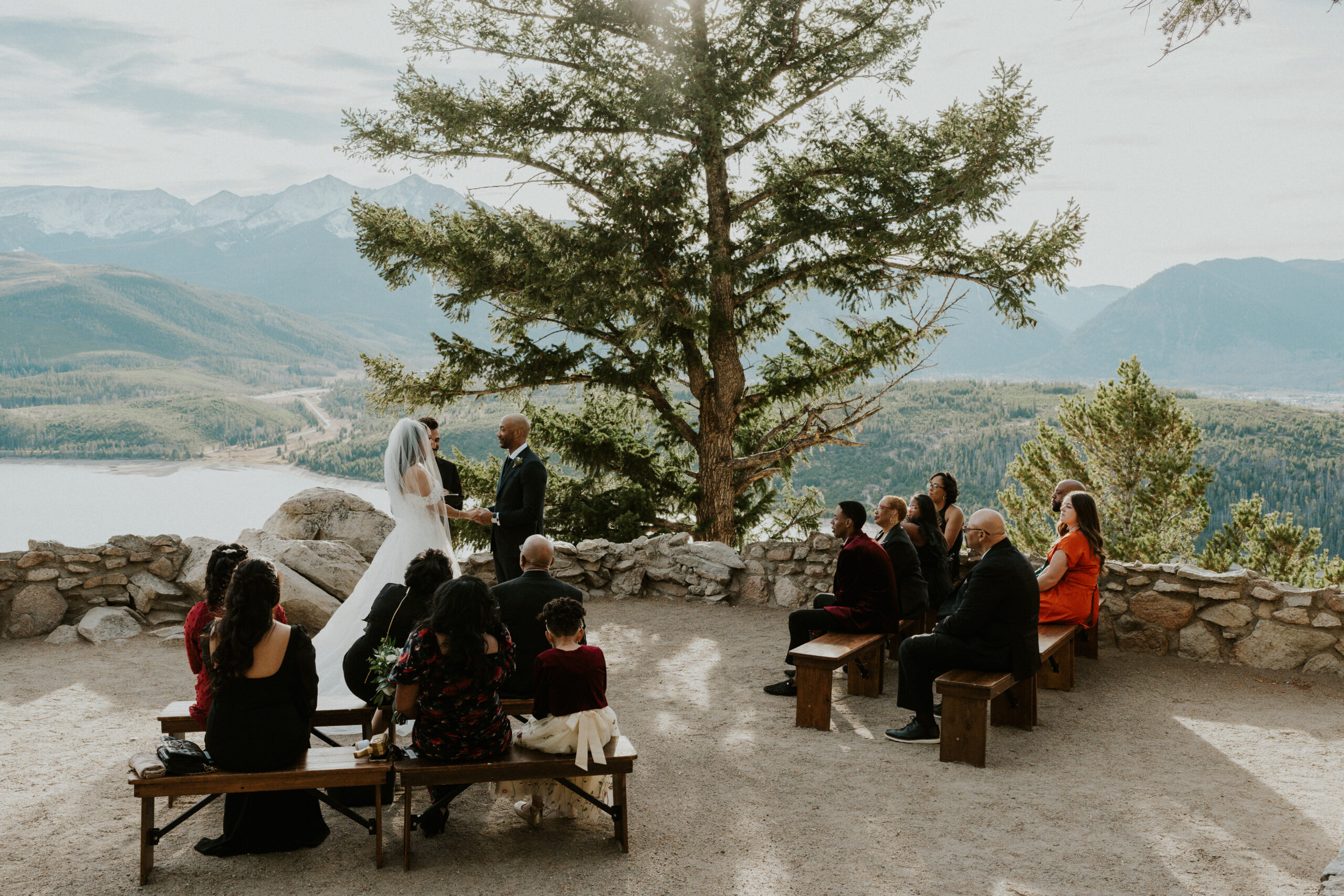 Bride and Groom say their vows in front of their closest friends and family at Sapphire Point Overlook