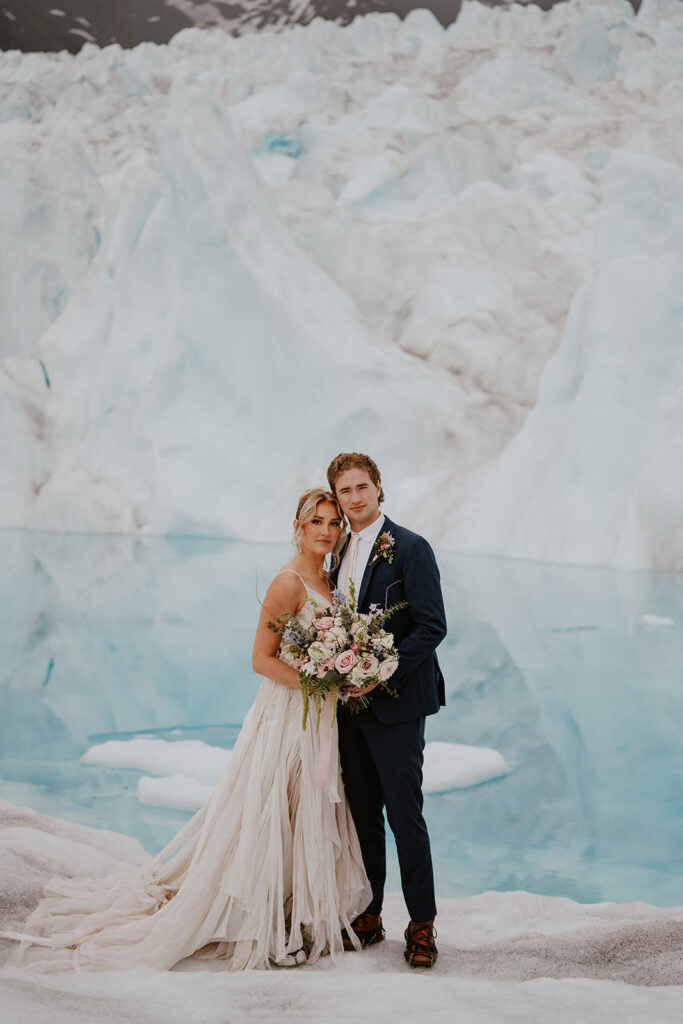 Bride and grooms portraits at Knik Glacier from their Alaska helicopter elopement