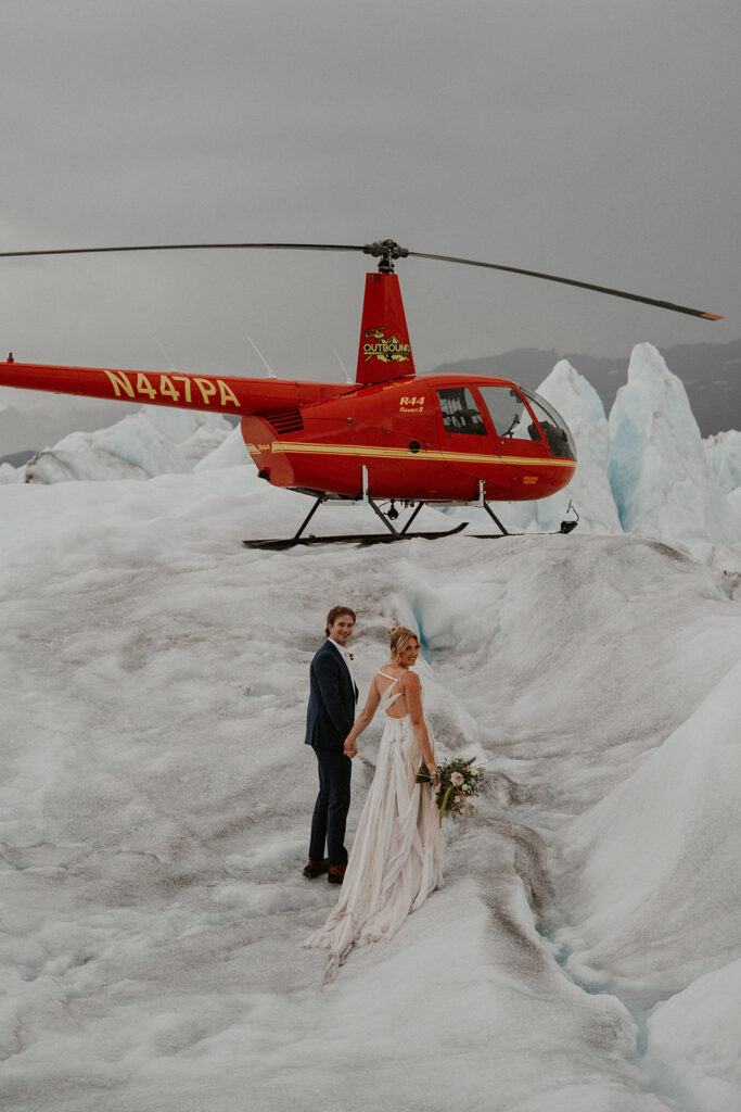 Bride and grooms portraits at Knik Glacier from their Alaska helicopter elopement