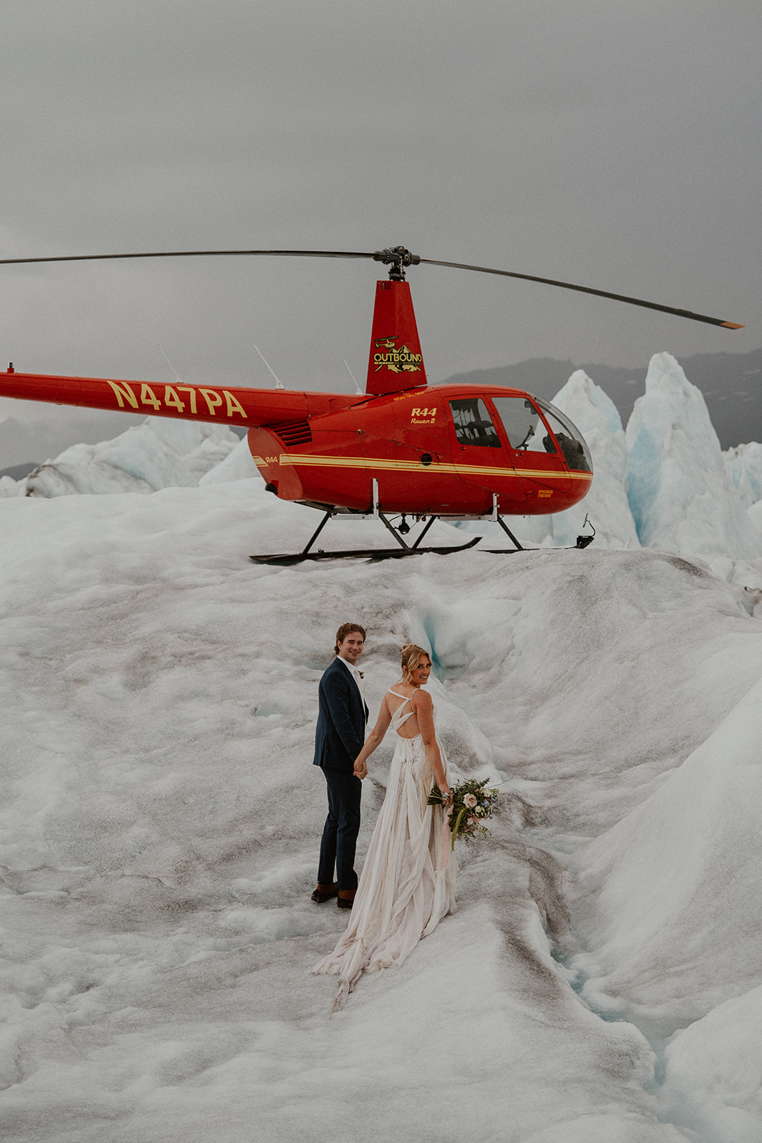 Bride and grooms Alaska helicopter elopement portraits at Knig Glacier