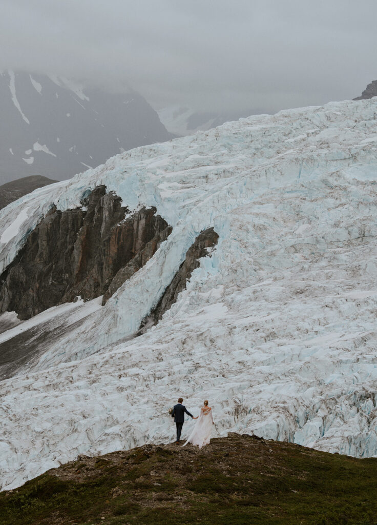 Bride and grooms portraits from their adventure Alaska helicopter elopement at Knik Glacier