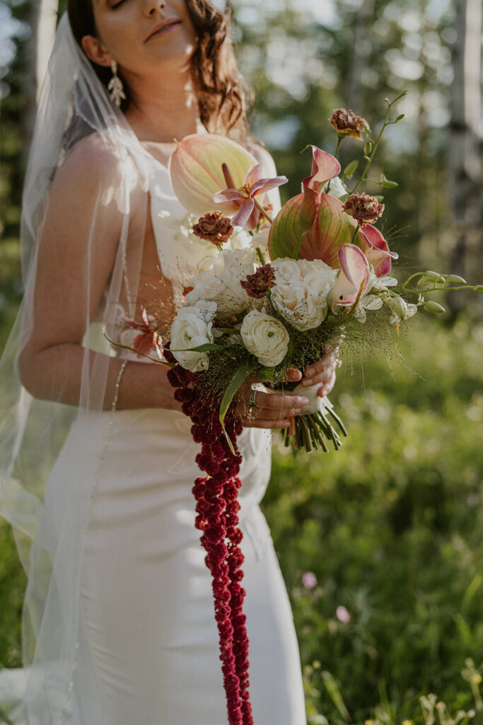 Outdoor bridal portraits from a Breckenridge Colorado elopement with florals by Lady Sunshine Floral