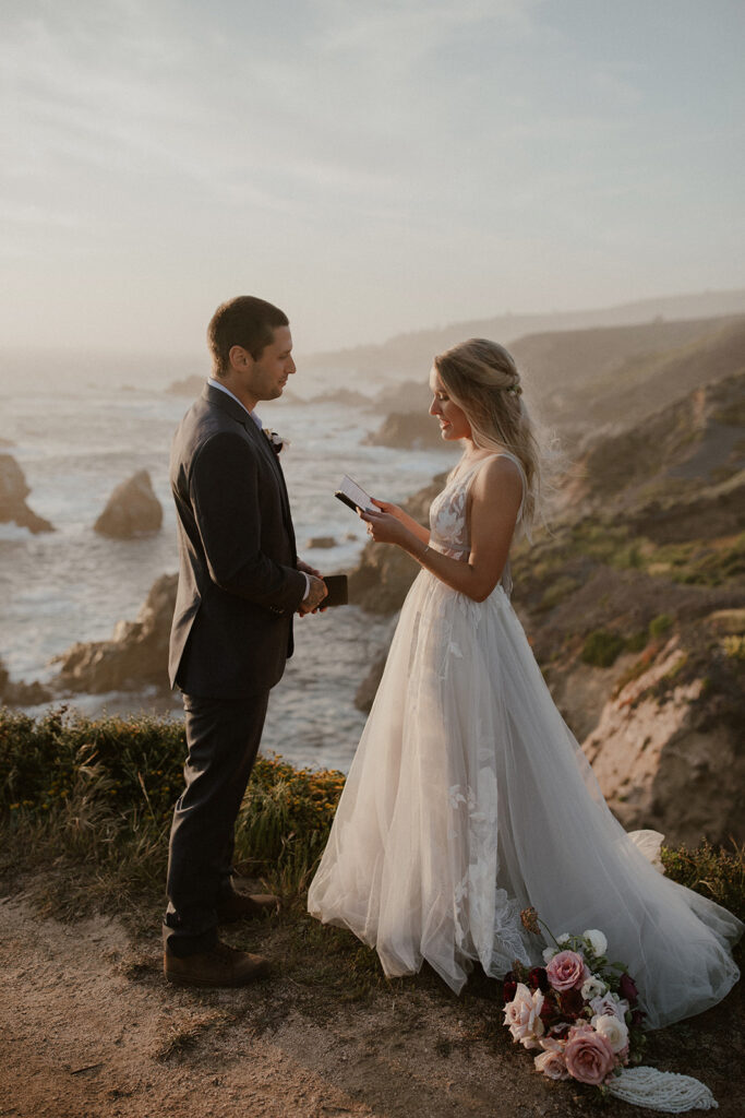 Couple exchanging vows cliffside in Big Sur