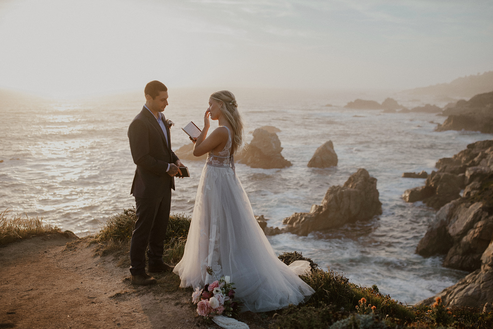 Bride getting emotional during her sunset vows in Big Sur, California