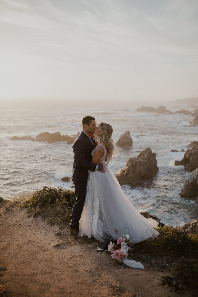 Bride and groom kissing during their Big Sur, California elopement photos