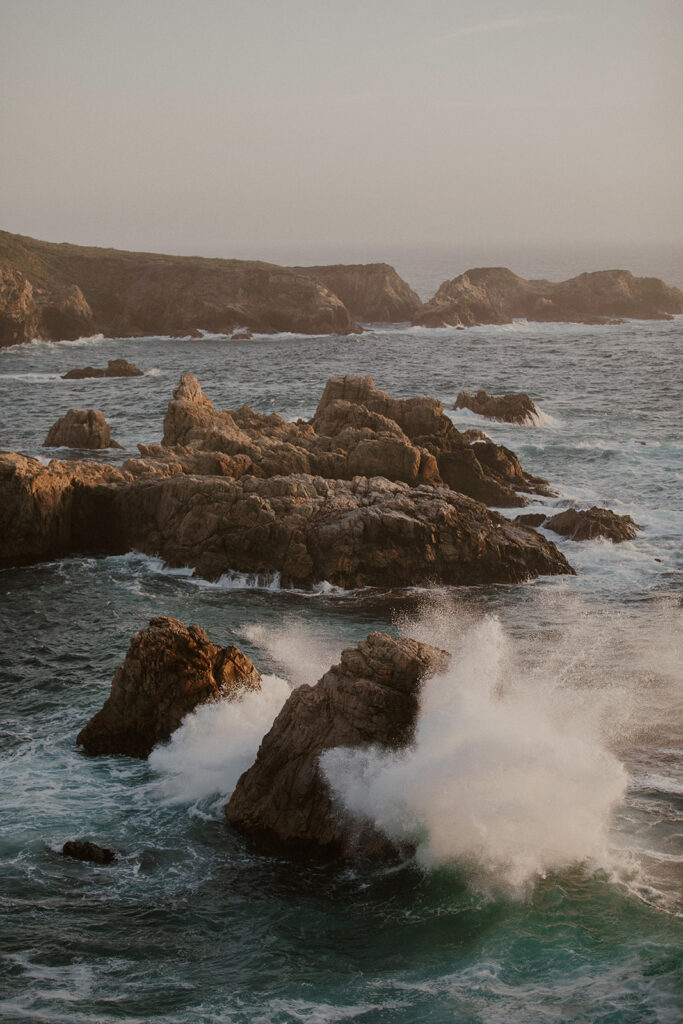 Waves crashing into the rocks in Big Sur