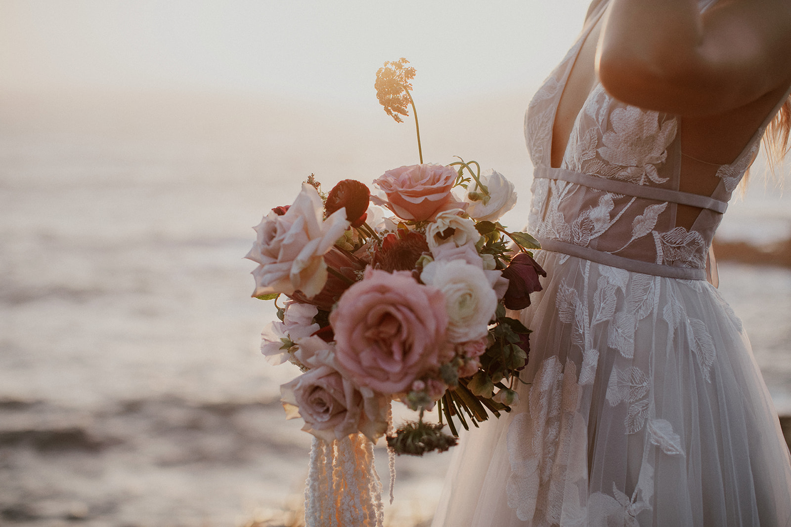 Bride posing at sunset in Big Sur, California