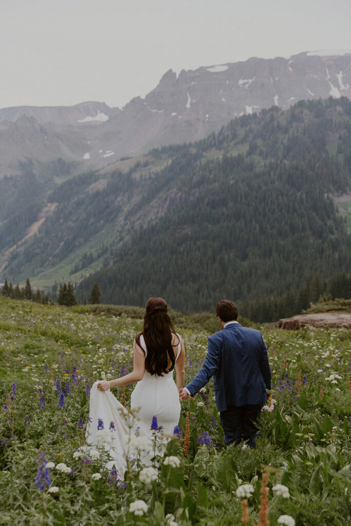 Colorado wildflower elopement bride and groom portraits