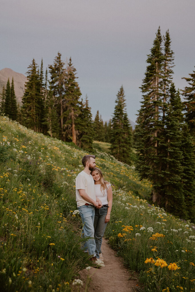 Couple holding each other on the trails in Crested Butte