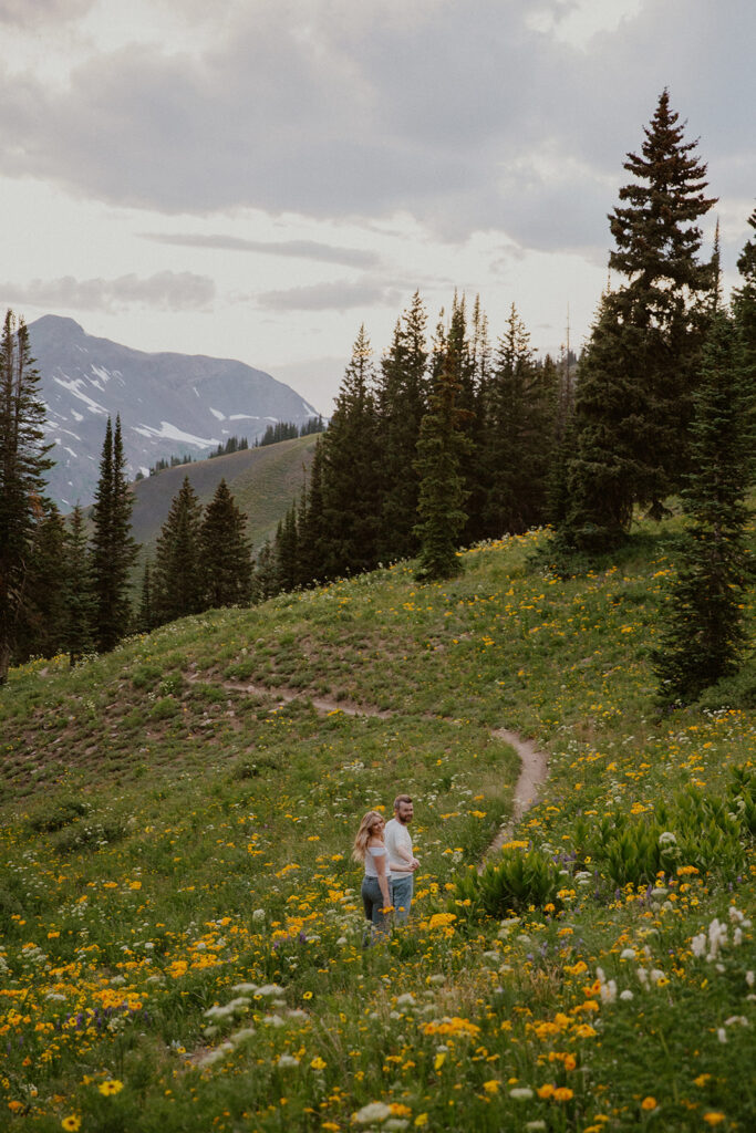Couple holding hands and walking the trails