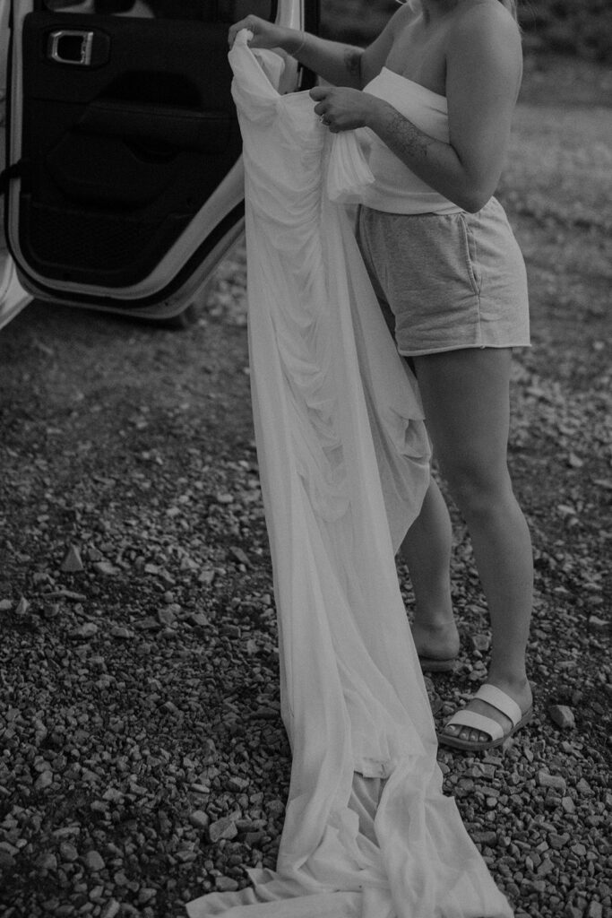 Black and white photo of a bride getting ready for her San Juan Colorado mountain elopement