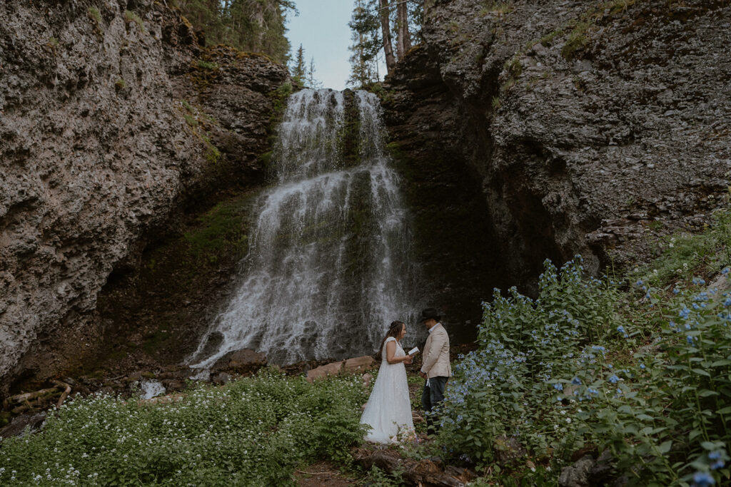 Colorado mountain elopement portraits at a waterfall