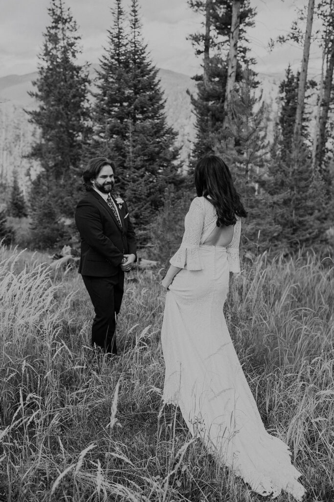 Breckenridge bride and groom first look moment