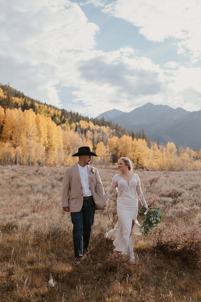 Bride and groom photos in Breckenridge with golden aspen trees in the backdrop