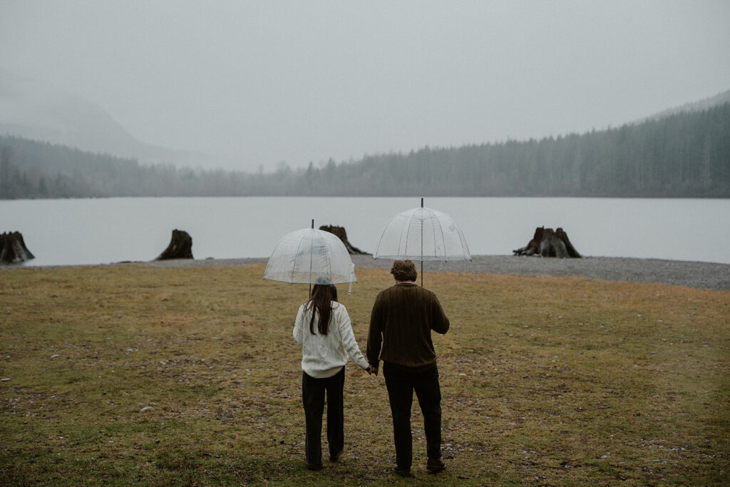 Moody and rainy Rattlesnake Lake engagement photos in Washington State