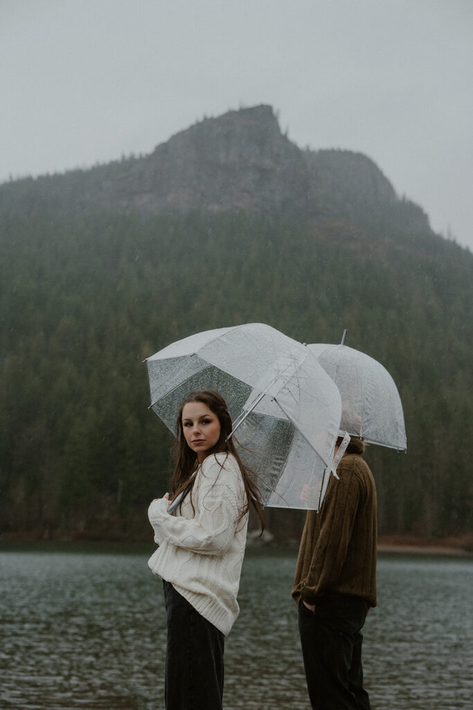 Moody and rainy Rattlesnake Lake engagement photos in Washington State