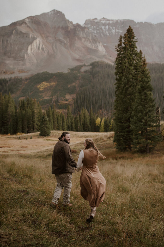 Playful Telluride engagement photos in the Colorado mountains