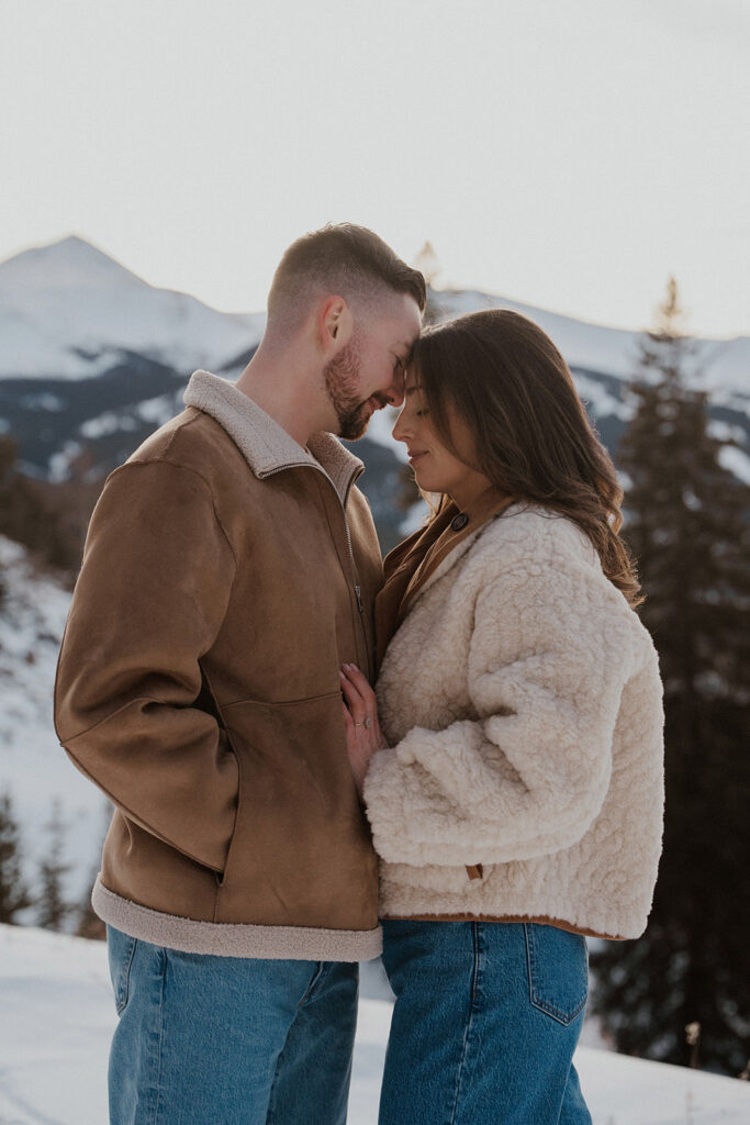 Snowy mountain engagement photos in Colorado