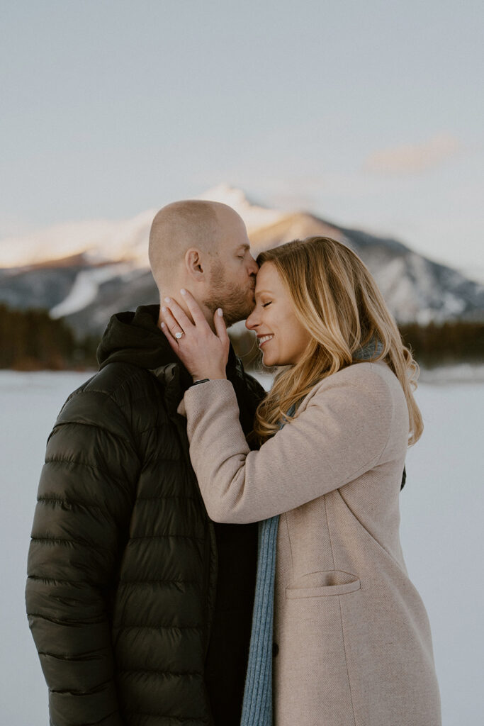Mountain engagement photos in the winter at Lake Dillon