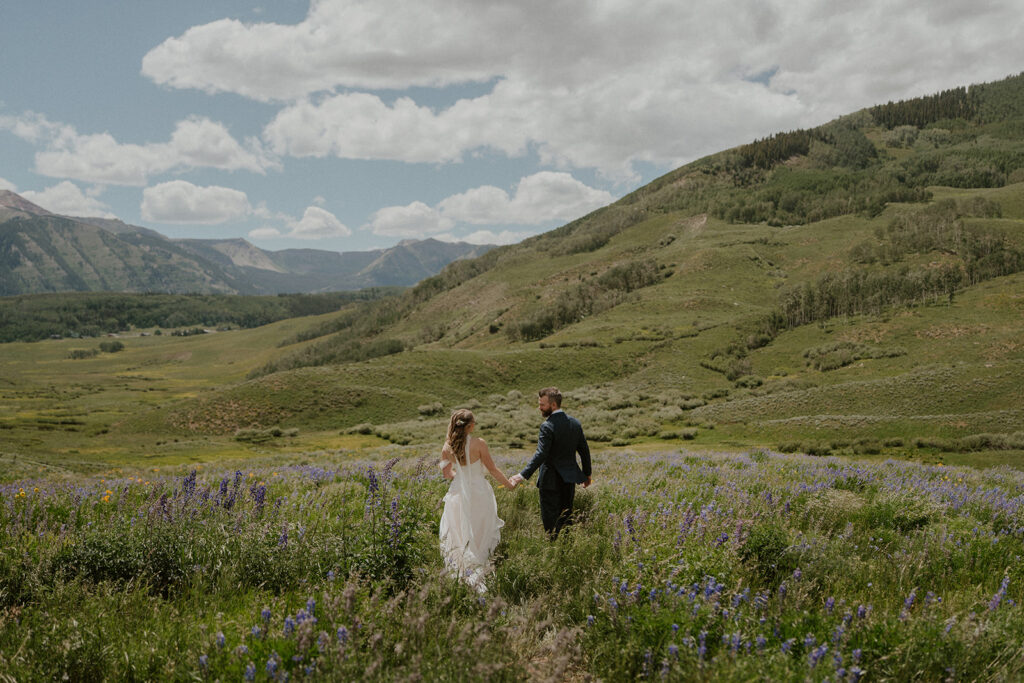 Sunny wildflower wedding portraits in Crested Butte, Colorado