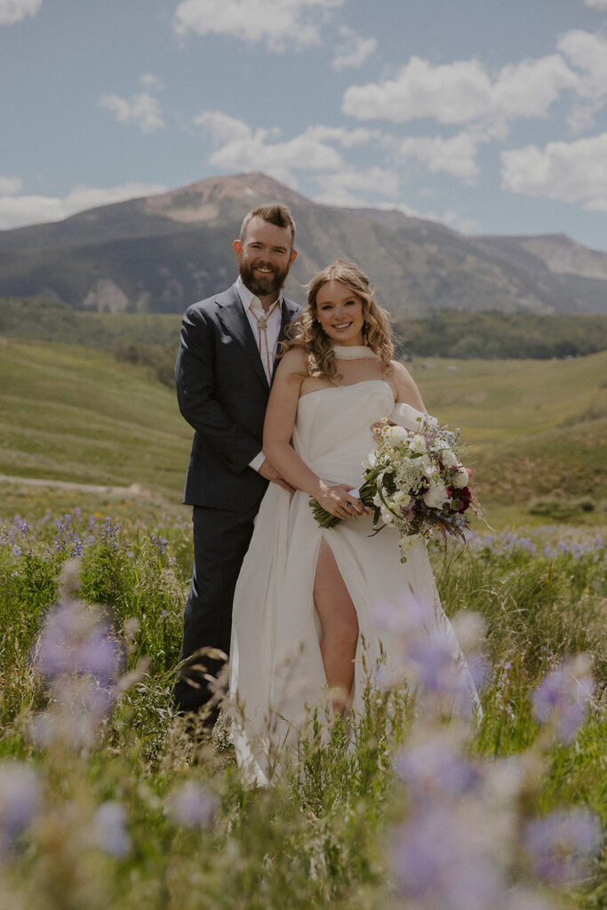 Sunny wildflower wedding portraits in Crested Butte, Colorado