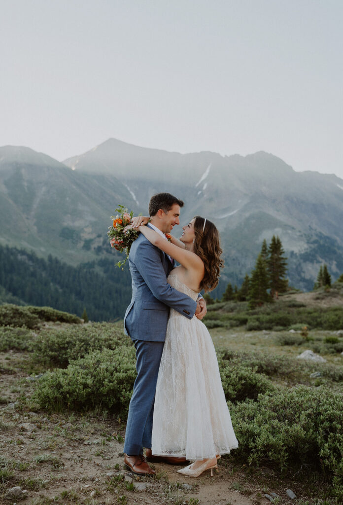 Sunrise mountain top elopement portraits on Loveland Pass in Colorado