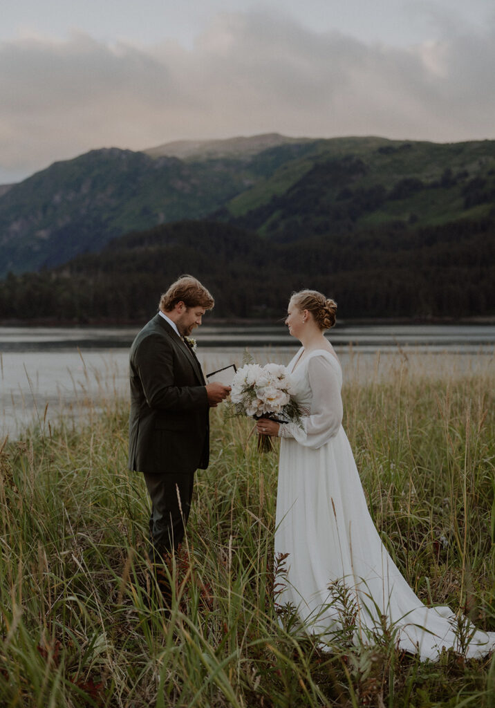 Alaska elopement vows near the ocean in Between Beaches