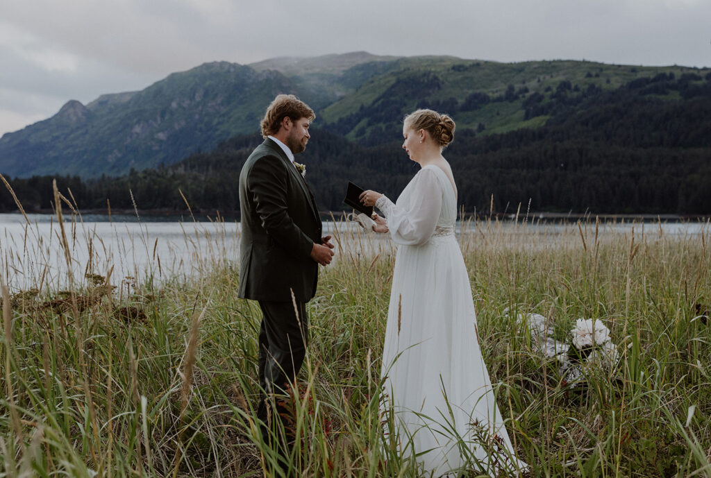 Alaska elopement vows near the ocean in Between Beaches