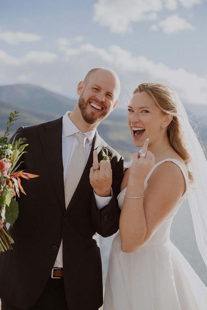 Bride and groom celebrate after their Aspen, Colorado Twin Lakes elopement ceremony