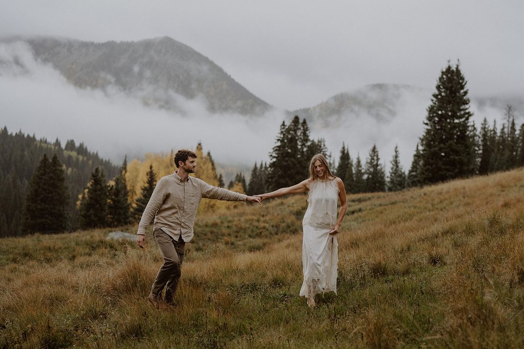 Cinematic and rainy wedding photos in the Colorado mountains