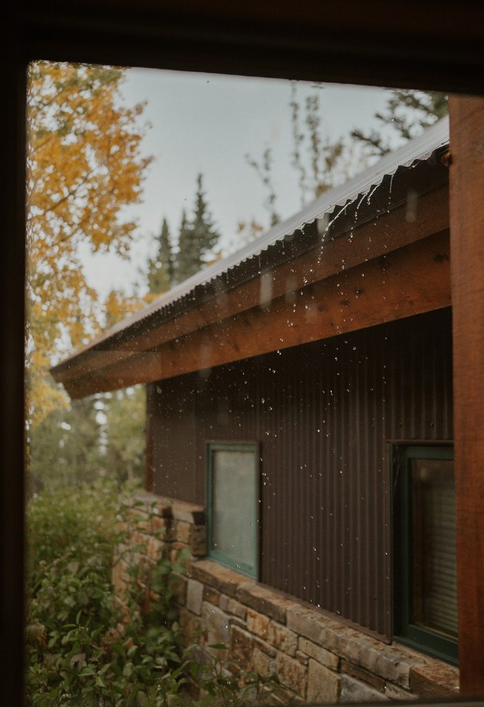 Rain falling off a home's roof in Telluride, Colorado