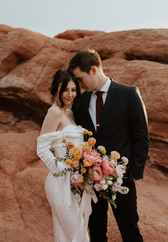 Bride and grooms Colorado Springs elopement portraits in Garden of The Gods