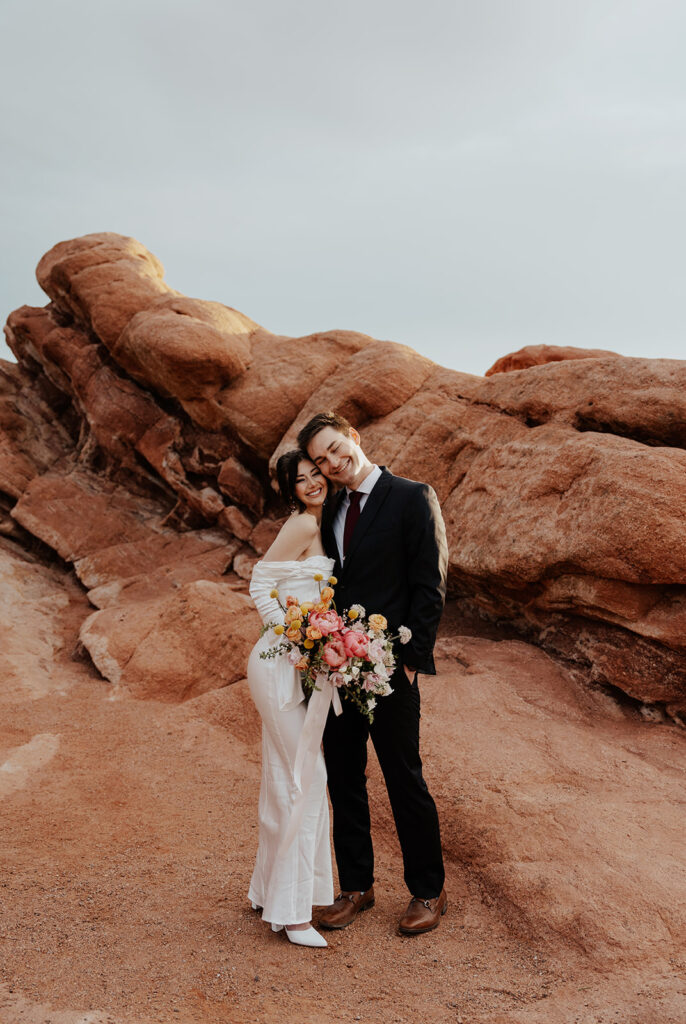 Bride and grooms Colorado Springs elopement portraits in Garden of The Gods