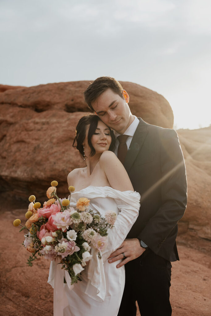 Bride and grooms Colorado Springs elopement portraits in Garden of The Gods