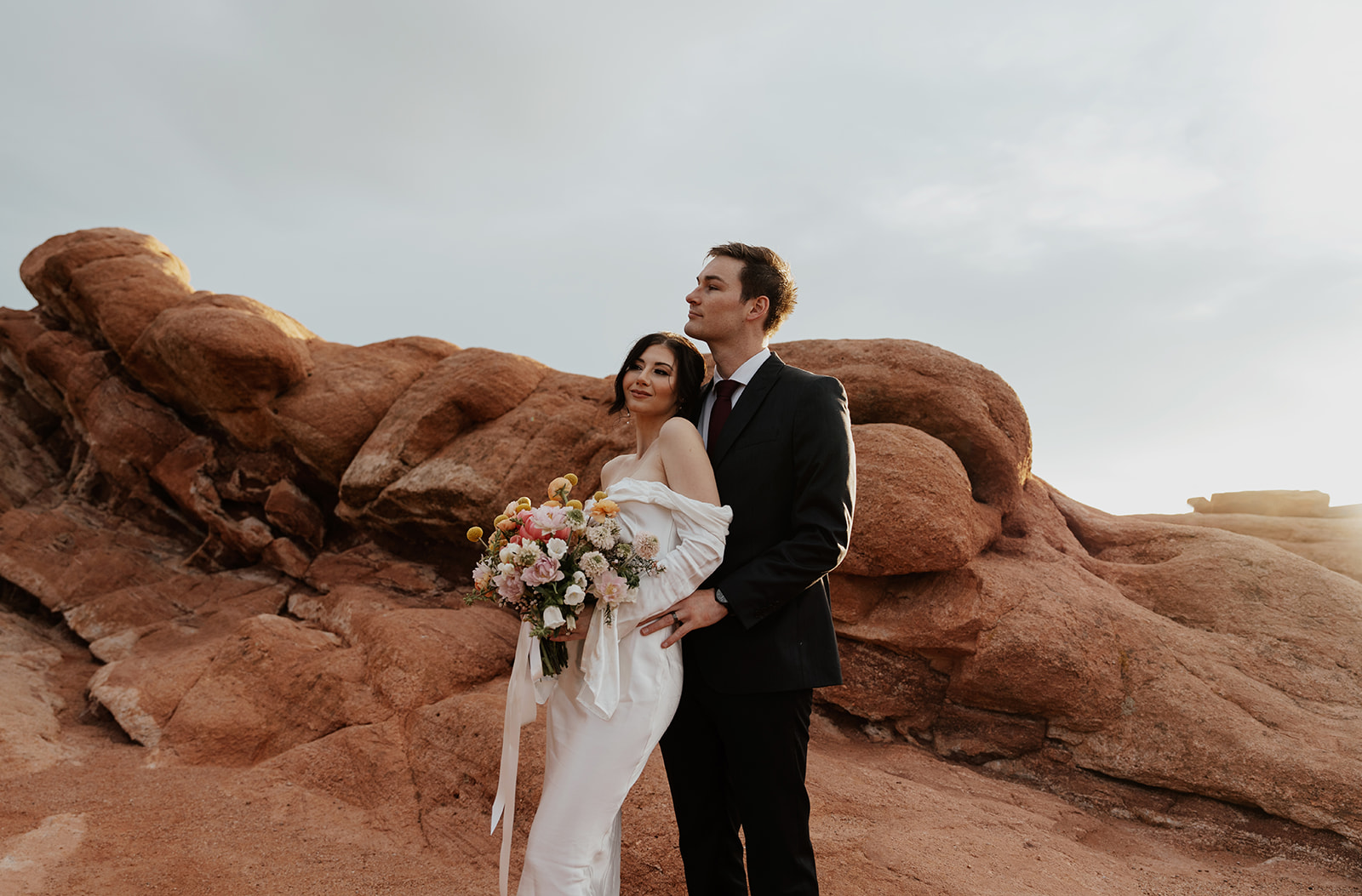 Bride and groom portraits against the red rocks in Garden of The Gods