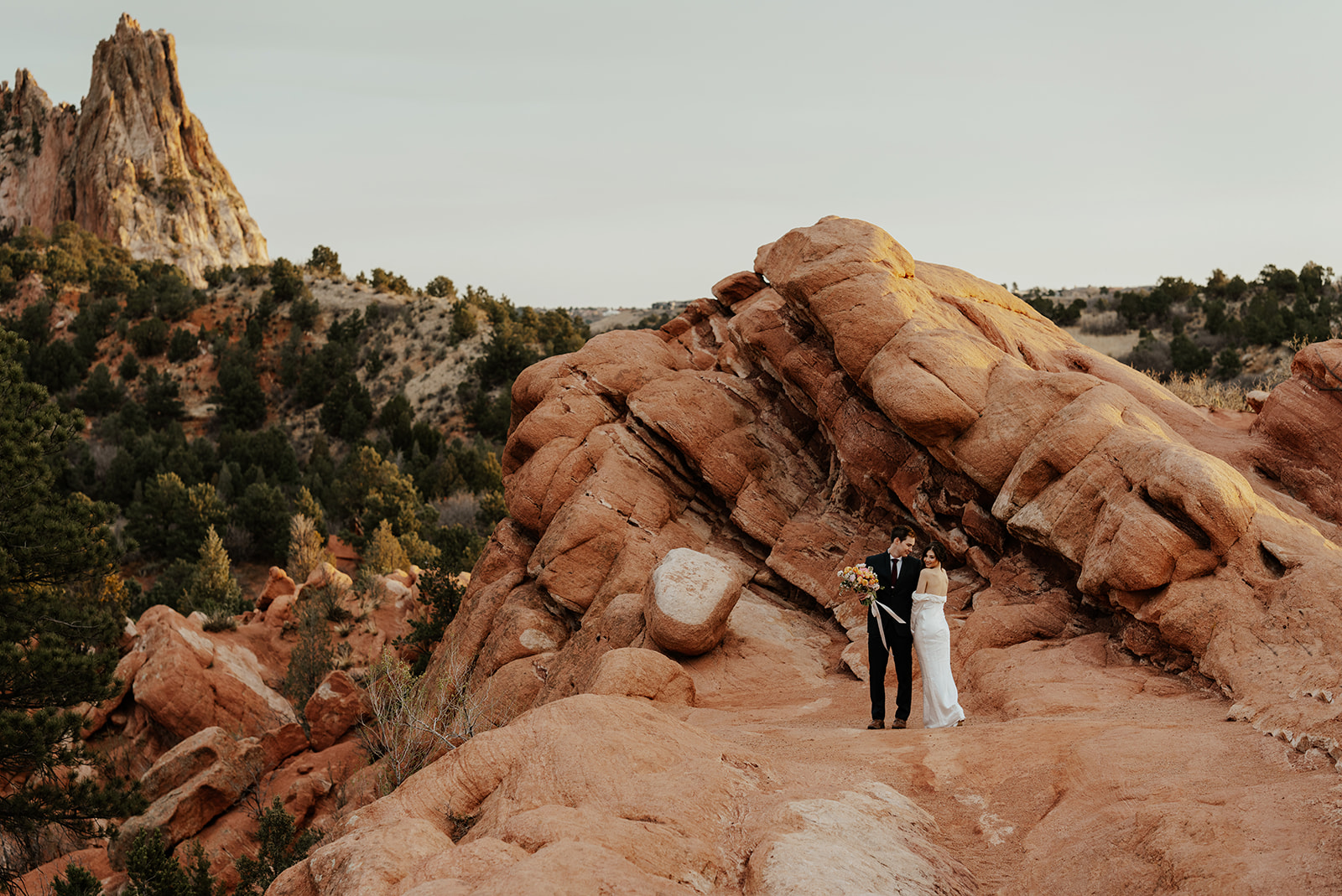 Bride and groom posing for their Colorado Springs elopement portraits