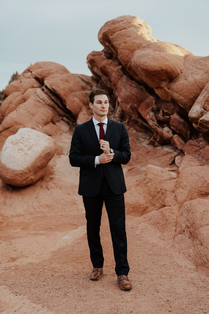 Outdoor grooms portraits in Garden of The Gods from a spring Colorado Springs elopement