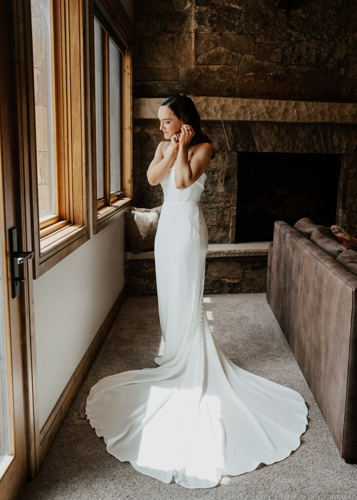 Indoor bridal portraits from an Airbnb elopement in Breckenridge, Colorado at Northwoods