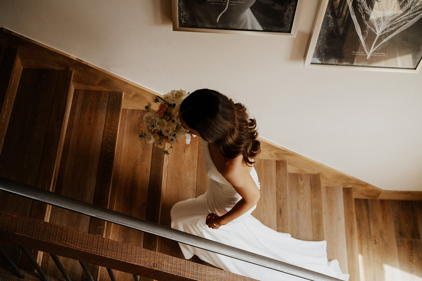 Bride walking up the stairs at Northwoods in Breckenridge, Colorado