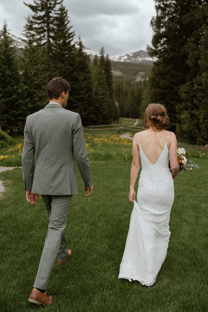 Bride and groom walking together after their elopement ceremony