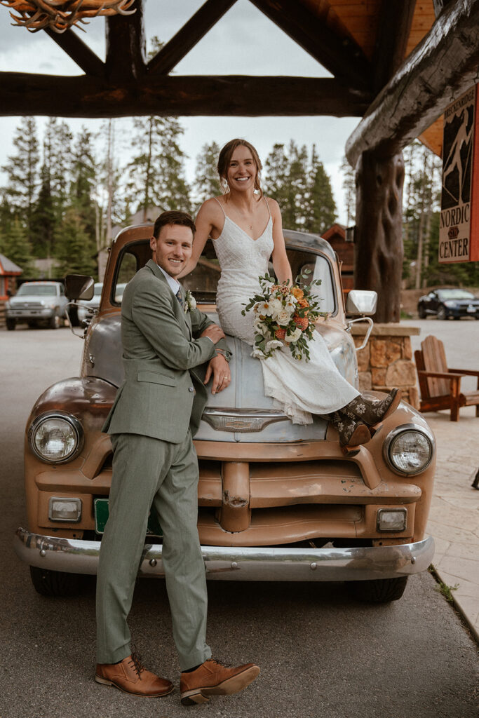 Bride and grooms portraits with an old Chevy truck