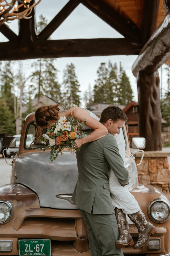 Bride and grooms portraits with an old Chevy truck