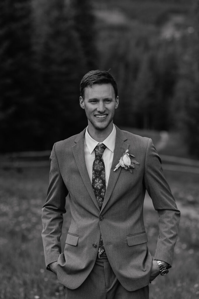 Black and white outdoor grooms portrait