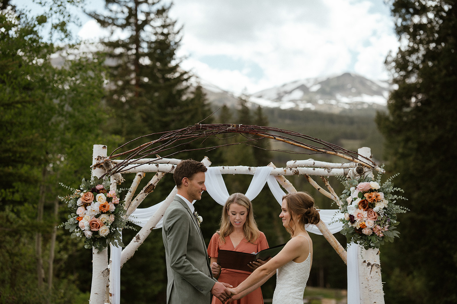 Bride and grooms intimate Colorado mountain elopement ceremony in Breckenridge