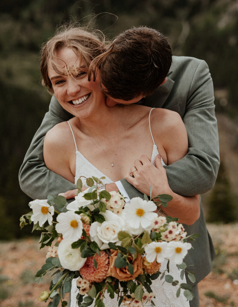 Bride and grooms mountain elopement photos on Peak 9 in Breckenridge