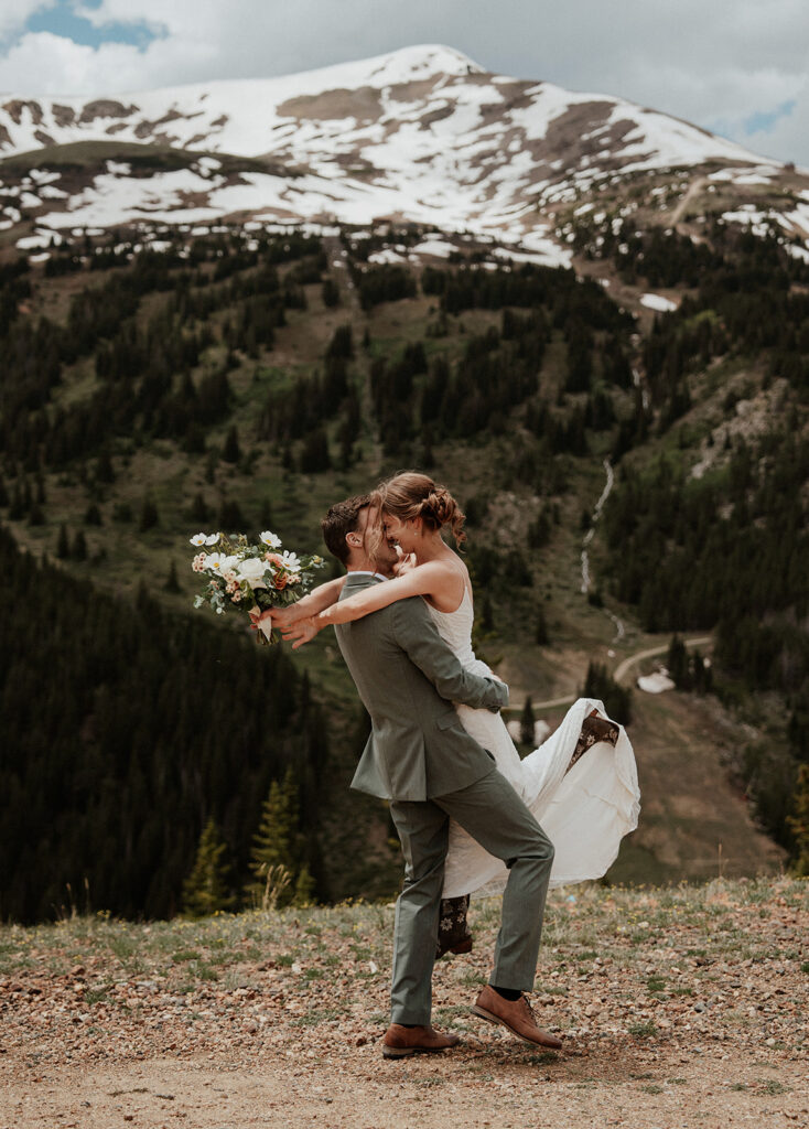 Bride and grooms Colorado mountain elopement portraits on Peak 9 in Breckenridge