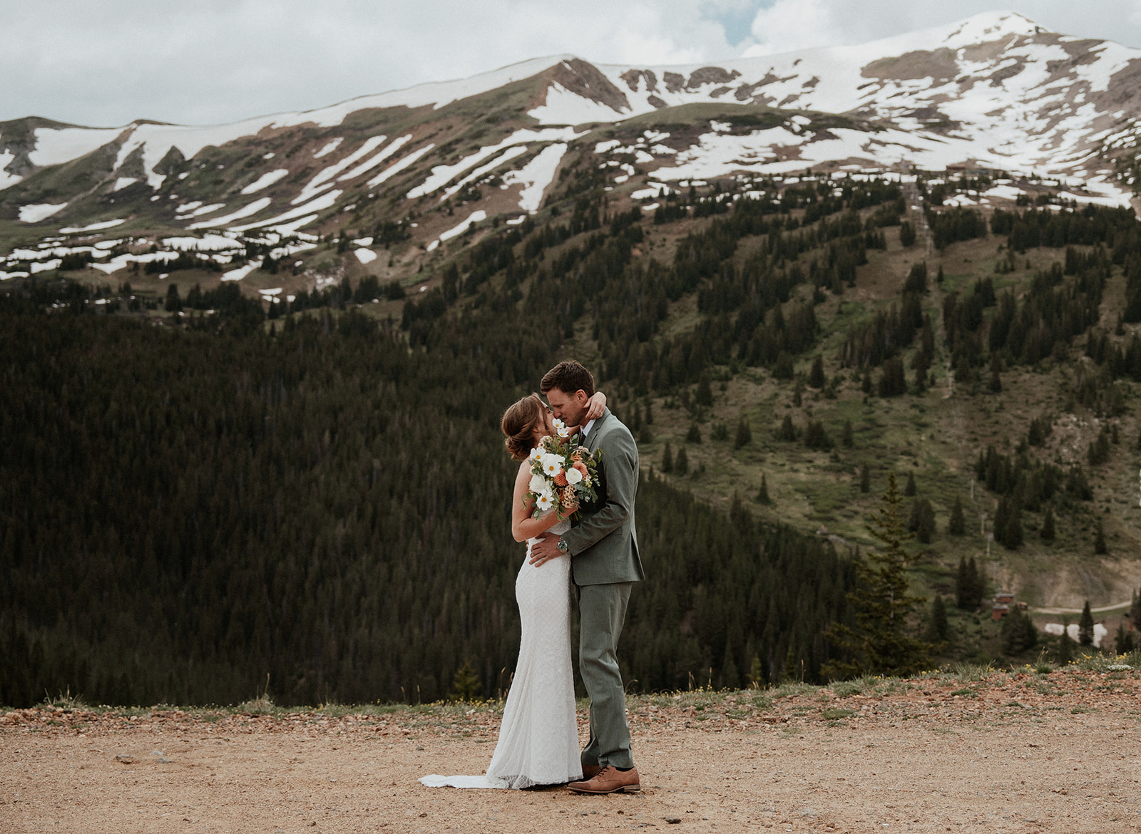 Bride and grooms first look during their Colorado mountain elopement on Peak 9 in Breckenridge