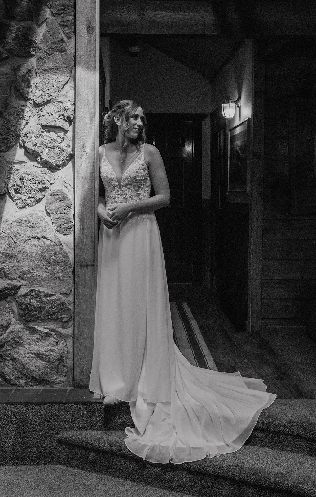 Black and white photo of a bride posing for portraits 