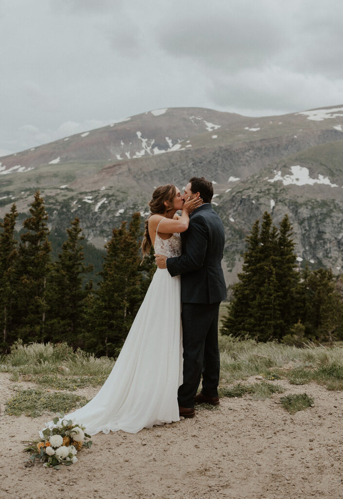 Bride and groom kissing during their Hoosier Pass elopement ceremony in Colorado