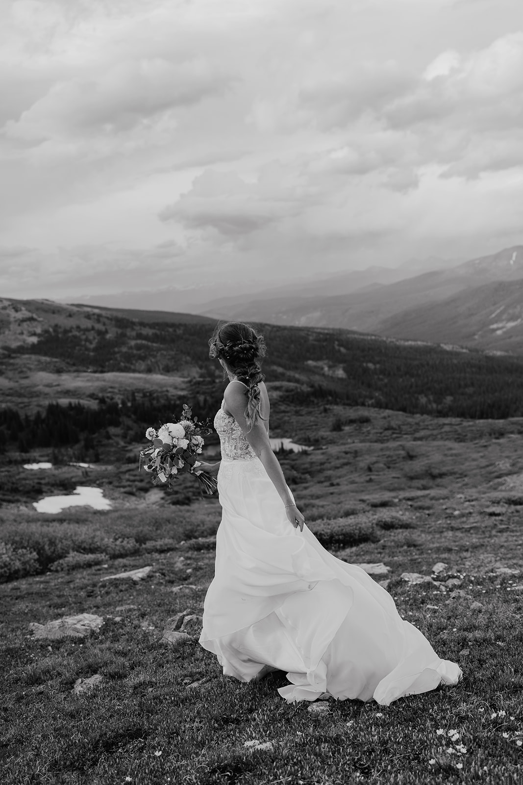 Black and white photo of a bride in the Colorado mountains of Hoosier Pass